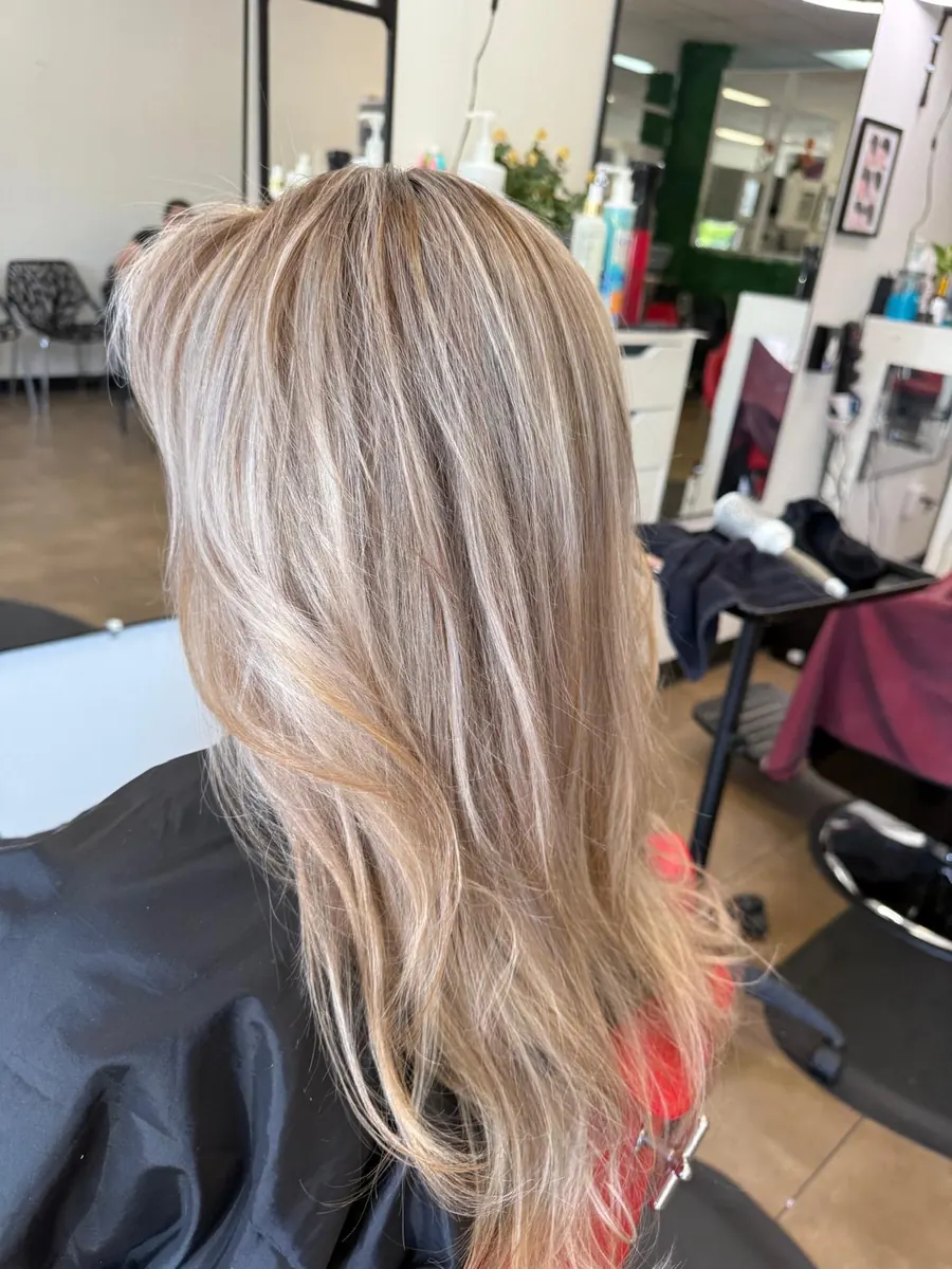 Bright blonde highlights carried through long layers